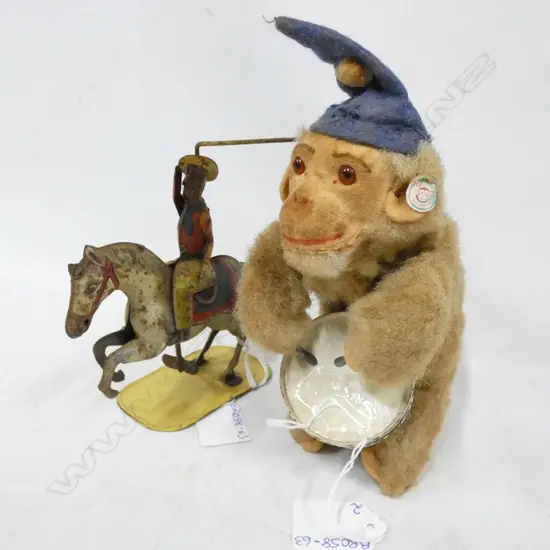 2 OLD WIND UP TOYS; COWBOY W LASSO ON HORSE (H.130MM) & MONKEY PLAYING DRUM (H.180MM)